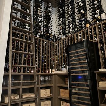 Camille - How do you cram an entire wine cellar into a small restaurant? Go up, of course. - French Near Me - Orlando, Florida