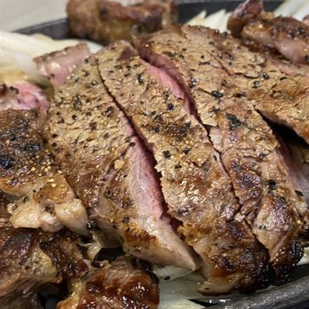 Side Street Inn - 12 Oz . Sizzling Rib Eye Steak - Sports Bars Near Me - Honolulu, Hawaii Side Street Inn - 12 Oz . Sizzling Rib Eye Steak - Sports Bars Near Me - Honolulu, Hawaii