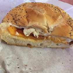 Half of my egg whites, bacon and cheddar cheese egg sandwich.