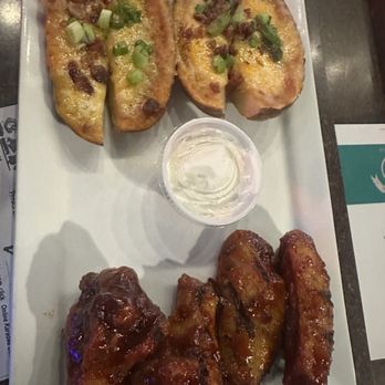Wallaby's Grill & Pub - Potato Skins and Chicken Wings - Sports Bars Near Me - Lenexa, Kansas Wallaby's Grill & Pub - Potato Skins and Chicken Wings - Sports Bars Near Me - Lenexa, Kansas