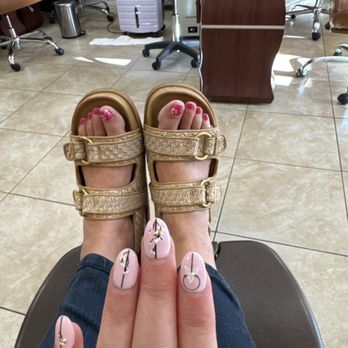 Natural Nails - Gel acrylic manicure with sticker art And regular pedicure with hand drawn flower on big toe - Nail Salons Near Me - Thousand Oaks, California Natural Nails - Gel acrylic manicure with sticker art And regular pedicure with hand drawn flower on big toe - Nail Salons Near Me - Thousand Oaks, California
