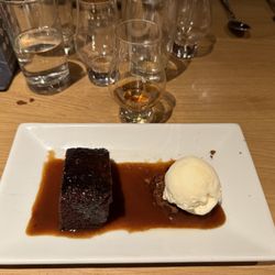 Amber Restaurant - Sticky toffee pudding dessert with an Edradour 10 year old single malt.
