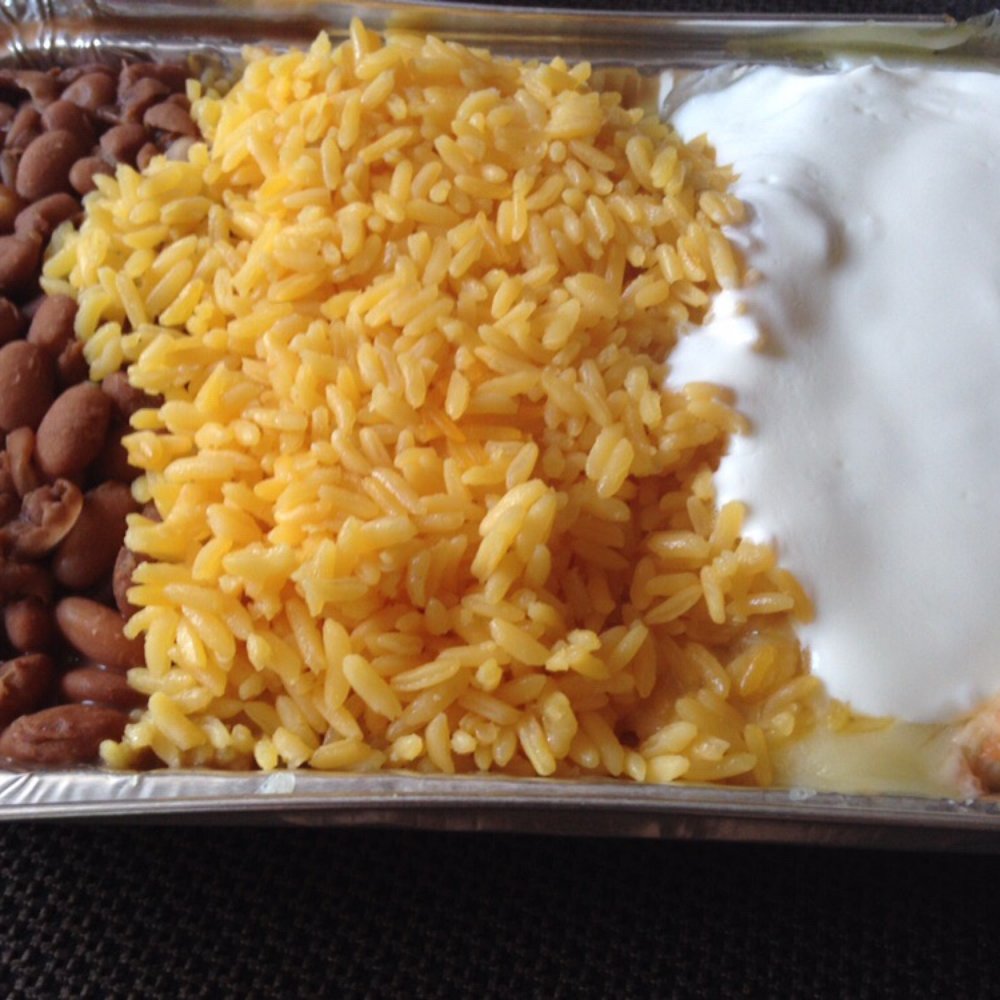 El Rancho Burritos - Enough sour cream for ya? - Mexican Near Me - New York, New York