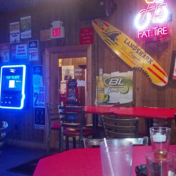 Buffalo's - a surfboard hanging from the ceiling - American Near Me - Griffin, Georgia Buffalo's - a surfboard hanging from the ceiling - American Near Me - Griffin, Georgia