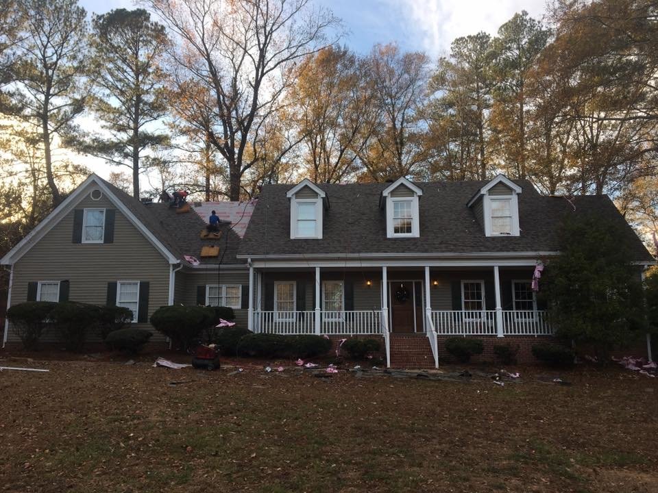 Slide of Rainblocker Roofing & Construction