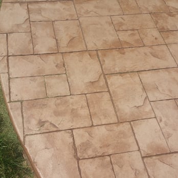 Montell Construction - Jonathon M's stamped concrete patio and concrete pad under deck. - Roofing Near Me - Caledonia, Michigan Montell Construction - Jonathon M's stamped concrete patio and concrete pad under deck. - Roofing Near Me - Caledonia, Michigan