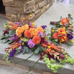 Closeup of the stunning, detachable arrangement created for the ceremony. This piece was displayed on a wood cross (see other pic). Closeup of the stunning, detachable arrangement created for the ceremony. This piece was displayed on a wood cross (see other pic).