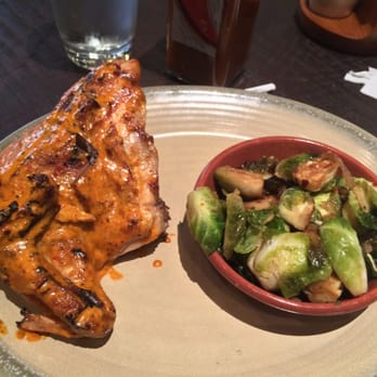 Nando's Peri-Peri - 1/4 chicken breast & wing extra hot with braised brussels sprouts. Spicy! - Chicken Shop Near Me - OakPark, Illinois Nando's Peri-Peri - 1/4 chicken breast & wing extra hot with braised brussels sprouts. Spicy! - Chicken Shop Near Me - OakPark, Illinois
