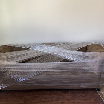 Light Moving - Wrapped sofa - Movers Near Me