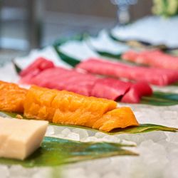 Imperial Sushi & Seafood Buffet - Fresh salmon, tuna, and yellowtail sashimi (available for dinner)
