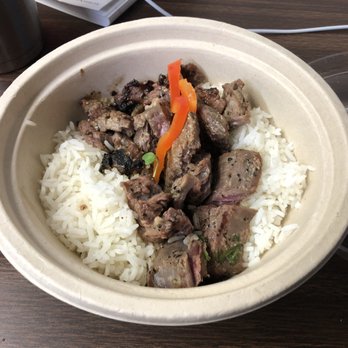 Crushcraft Thai Eats - The steak for the Panang curry on a bed of jasmine rice, the sauce comes on the side. Unique way to serve this! - Thai Near Me - Dallas, Texas