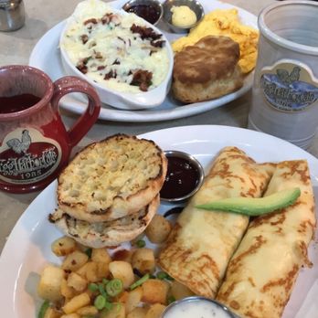 Egg Harbor Cafe - Top: Georgia grits and eggs with biscuit Bottom: Cassie's crêpes with English muffin - Breakfast & Brunch Near Me - Alpharetta, Georgia