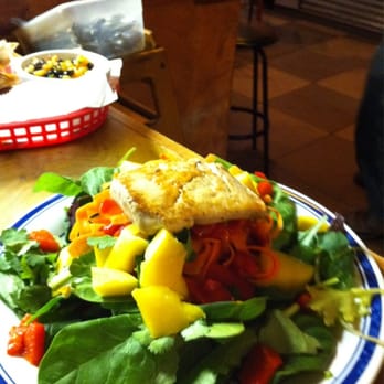 Global Cafe - Salmon Salad fresh spinach, carrot , Red Peppers, Mango, Topped w Honey Chipotle Vinaigrette - Breakfast & Brunch Near Me - Lawrence, Kansas