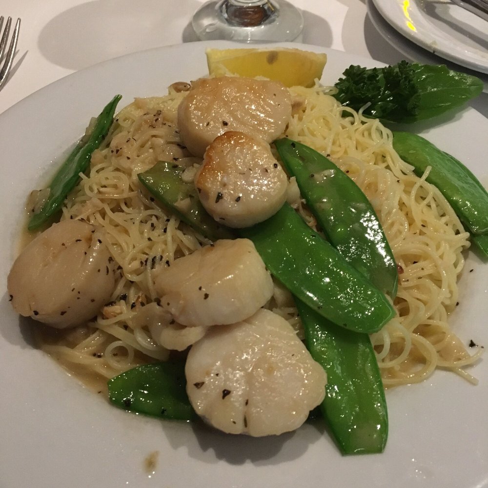 Assaggio Bistro - Scallops alla Scampi, small portion! More than enough for one meal. Very rich but enough lemon to cut through the butter white wine sauce. - Italian Near Me - Honolulu, Hawaii Assaggio Bistro - Scallops alla Scampi, small portion! More than enough for one meal. Very rich but enough lemon to cut through the butter white wine sauce. - Italian Near Me - Honolulu, Hawaii