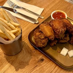 Chick Chick - Chicken Wings (10 Pieces) with French Fries and 2 cans of soda........$40