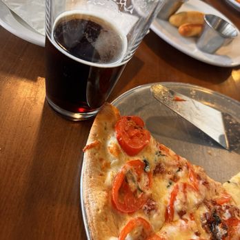 Angel Fired Pizza - Can't remember the name but olive oil, bacon tomatoes and cheese. It was amazing! The crispy ravioli is a must try also!! - Pizza Near Me - Angel Fire, New Mexico