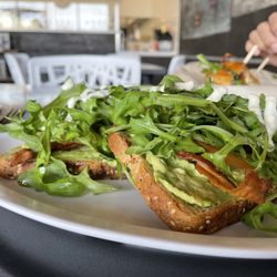 Daily Spark Coffee - BLT Toast and Spark Croissant in the background