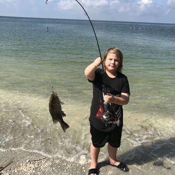 Turner Beach - First fish of the day! Snapper! - Beaches Near Me - Captiva, Florida