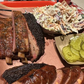 Terry Black's Barbecue - Pork Ribs, Jalapeño Sausage, Cole Slaw and pickles - Barbeque Near Me - Austin, Texas Terry Black's Barbecue - Pork Ribs, Jalapeño Sausage, Cole Slaw and pickles - Barbeque Near Me - Austin, Texas