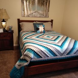 Log Cabin Quilt Shop - Quilt and pillow that we purchased at the shop!