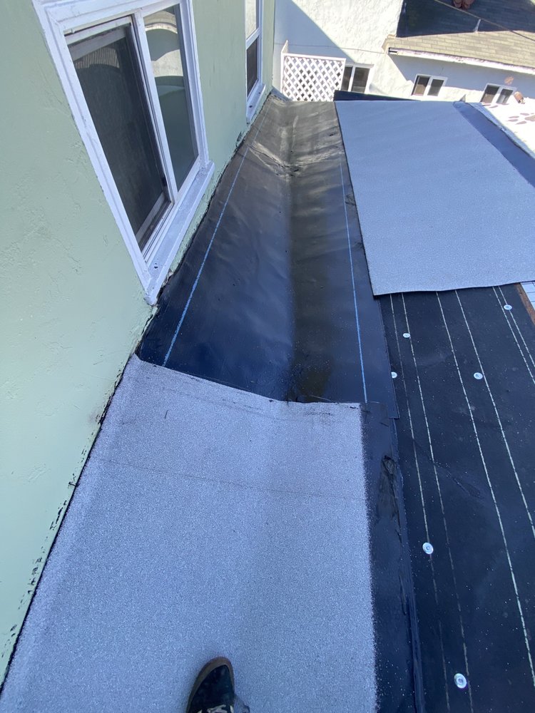 Slide of Delino’s Roofing & Remodeling