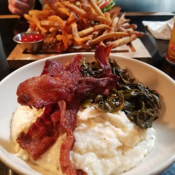 Smith - Grits with greens and bacon. Yum! - Bars Near Me - Seattle, Washington
