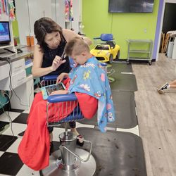 Rainbow Kids Hairstyling - My boy's fantastic, friendly, and top-notch barber, Lien! She never disappoints!!