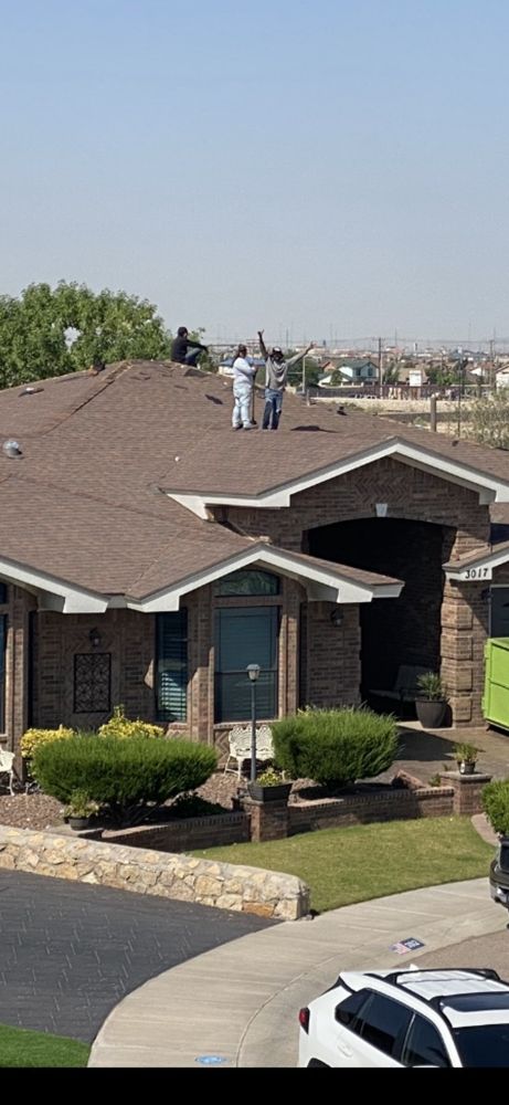 Slide of Mann & Sons Roofing
