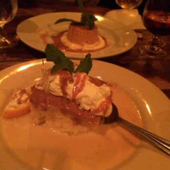 Cuban Pete's - Tres Leches with a birthday candle and Mango Flan - Cuban Near Me - Montclair, New Jersey