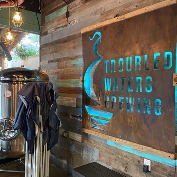 Troubled Waters Brewing - a sign for the brewery - Breweries Near Me - Safety Harbor, Florida