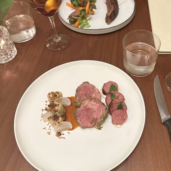 Lilac - Duck Au Poivre and Colorado Lamb Loin - Mediterranean Near Me - Tampa, Florida Lilac - Duck Au Poivre and Colorado Lamb Loin - Mediterranean Near Me - Tampa, Florida