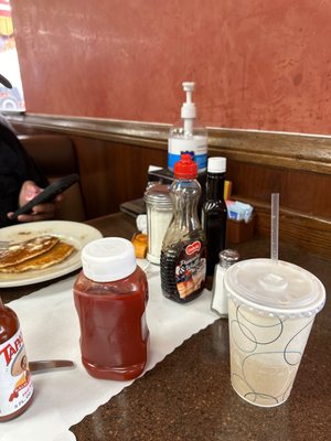 Photo of Harry's Cafe - Stanton, CA, US. This place is set with condiments