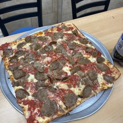 Gio's Pizza & Restaurant - Grandma's pizza with meatballs, extra sauce, and extra garlic.