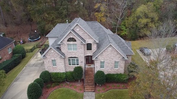 Re-roof in Hoover - Architectural Shingles in Weathered Wood - This was a 21-year-old roof located in Hoover. We replaced it with Architectural shingles. Color - Weathered Wood. From start to finish, in 1 day. Re-roof in Hoover - Architectural Shingles in Weathered Wood - This was a 21-year-old roof located in Hoover. We replaced it with Architectural shingles. Color - Weathered Wood. From start to finish, in 1 day.