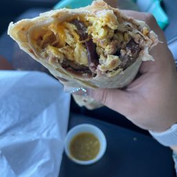 Bacon and sausage breakfast burrito