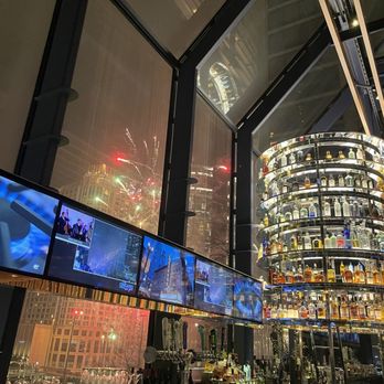 BIG Bar - a view of a city at night - Lounges Near Me - Chicago, Illinois BIG Bar - a view of a city at night - Lounges Near Me - Chicago, Illinois