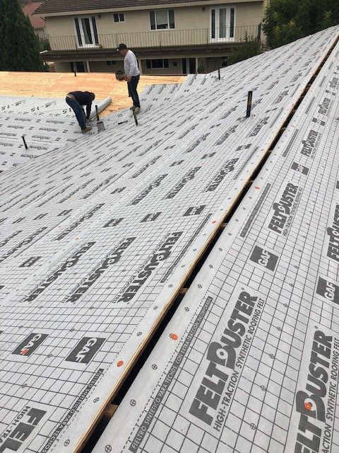 Slide of Roof & Gutter Busters