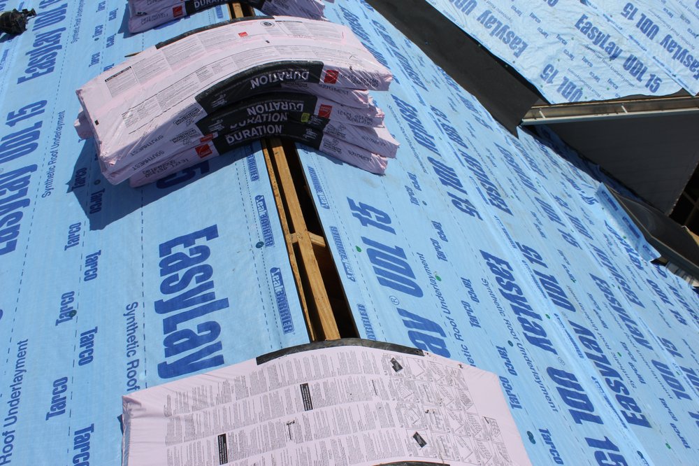 Slide of Roofing Giant