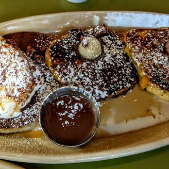Snooze, an A.M. Eatery - Pancake flight-Nana's hot cocoa, sweet potato and pineapple upside down pancakes - Breakfast & Brunch Near Me - Gilbert, Arizona Snooze, an A.M. Eatery - Pancake flight-Nana's hot cocoa, sweet potato and pineapple upside down pancakes - Breakfast & Brunch Near Me - Gilbert, Arizona