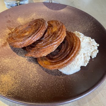Colita - Churros on a lake of dulce de leche with fresh whipped cream - New American Near Me - Minneapolis, Minnesota Colita - Churros on a lake of dulce de leche with fresh whipped cream - New American Near Me - Minneapolis, Minnesota