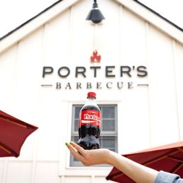 Exterior outside entrance of Porter’s - Nothing pairs better with barbecue than a Coke. - Nebraska City, Nebraska Exterior outside entrance of Porter’s - Nothing pairs better with barbecue than a Coke. - Nebraska City, Nebraska