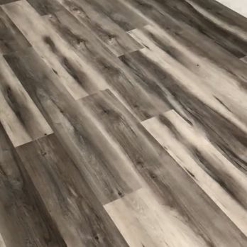 Adriatic Flooring - New vinyl with baseboards - Flooring Near Me