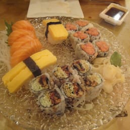 4 salmon, 2 tamago, eel cucumber and spicy tuna 4 salmon, 2 tamago, eel cucumber and spicy tuna