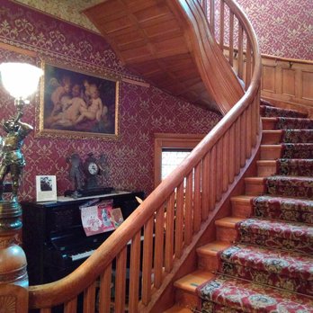 Ivinson Mansion - The flying staircase in the foyer. - Museums Near Me - Laramie, Wyoming Ivinson Mansion - The flying staircase in the foyer. - Museums Near Me - Laramie, Wyoming