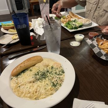 Frisco Bay Coastal Grill - Seafood pasta, captain's platter in back with broccoli - Cocktail Bars Near Me - Frisco, North Carolina Frisco Bay Coastal Grill - Seafood pasta, captain's platter in back with broccoli - Cocktail Bars Near Me - Frisco, North Carolina