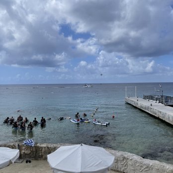 Sunset - Looking out over the beach toward the mainland - Bars Near Me - Cozumel, ROO Sunset - Looking out over the beach toward the mainland - Bars Near Me - Cozumel, ROO