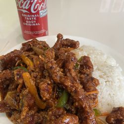 Sweet Basil Vietnamese Kitchen - Kick You Down Ginger Beef (spice level 3) with a small side of rice. Satisfyingly spicy for fans of spicy. You can customize how spicy it is
