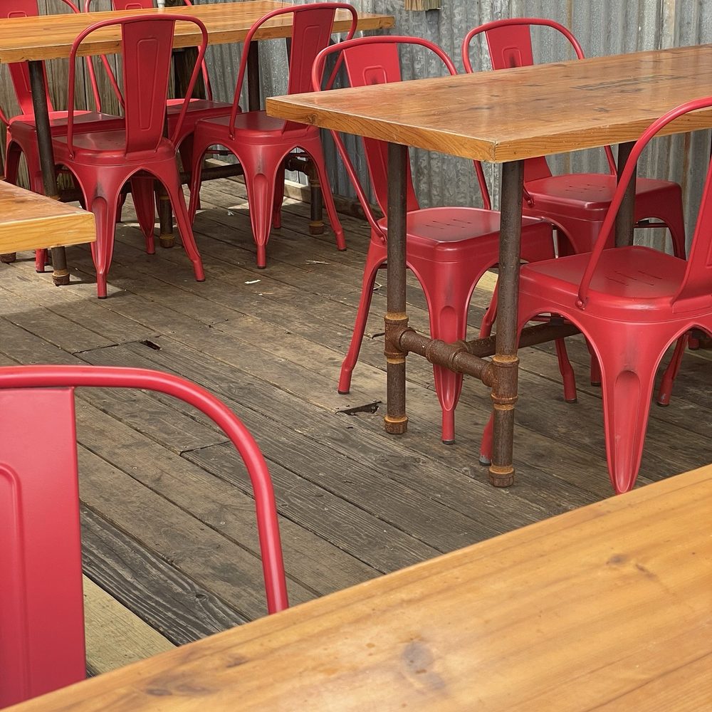 Neighbor's Kitchen & Yard - Tables outside - Pizza Near Me - Bastrop, Texas