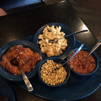 Mojo Old City BBQ - 4 sides of the whole hog dinner- mac n cheese, sweet mash, corn, and bbq beans! - Barbeque Near Me - St. Augustine, Florida