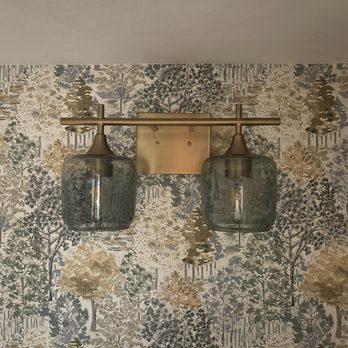 Bicycle Glass - Light fixture installed in half bath. As you can see globe on the left is darker. - Lighting Stores Near Me - Fridley, Minnesota Bicycle Glass - Light fixture installed in half bath. As you can see globe on the left is darker. - Lighting Stores Near Me - Fridley, Minnesota